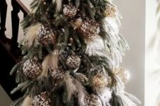 08 a creative boho Christmas tree with pampas grass and stylish brown ornaments and lights is a bold and catchy idea