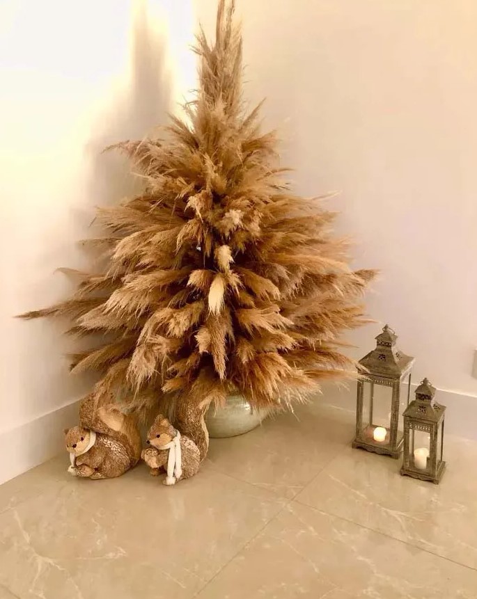 a mini pampas grass Christmas tree n a pot and non-decorated is a lovely decoration for an awkward nook or if you don't have much space