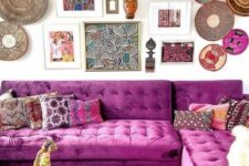 a maximalist living room with a gallery wall