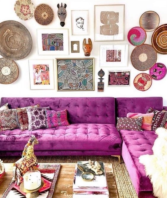 a maximalist living room with a gallery wall