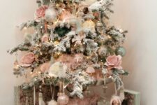 19 a refined vintage Christmas tree with lights, pink roses and silver, pink and green ornaments and fluffy pink garlands