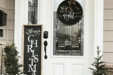 19 a round black and white Christmas sign with calligraphy and a bow on top is a lovely decor idea for Christmas