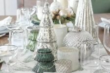 21 a beautiful Christmas tablescape with mercury glass trees and candleholders, metallic ornaments and evergreens