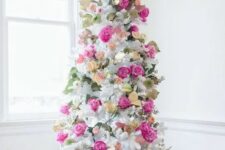 21 a romantic white Christmas tree decorated with hot pink and blush blooms, leaves and gilded foliage is super elegant