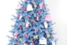 30 a blue Christmas tree decorated with socks, beanie, little plush toys and red and yellow ornaments