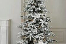 31 an Alaskan fir tree with some silver and clear ornaments looks very minimal and chic