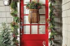 a lovely rustic christmas front door decor idea