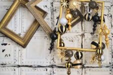 34 vintage gilded frames including one with gold and black ornaments hanging for lovely Christmas decor and a bold touch