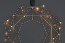 40 a simple and cool geometric himmeli holiday wreath with lights and no other detailing is a stylish modern decor idea