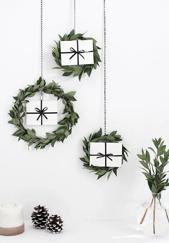 leafy wreaths with gift boxes inside for modern indoor and outdoor Christmas decor