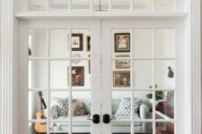 French doors with a transom window are an elegant solution to let more natural light inside and add chic to the space