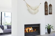 a beautiful double-sided fireplace with a concrete shelf and some decor right on it is a lovely idea for any space