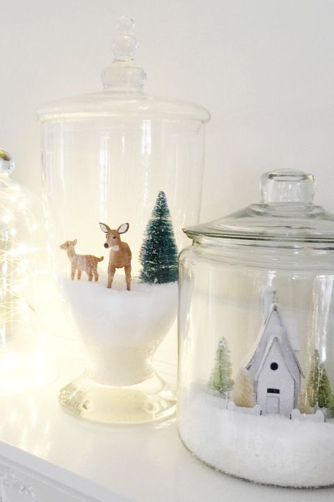 a couple of terrariums with faux snow, deer, bottle brush trees, a white house is a lovely idea for Christmas