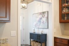 a vintage space with a doorway and a transom window installed here is a beautiful space with plenty of natural light
