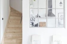 a cozy Scandi space with an interior window