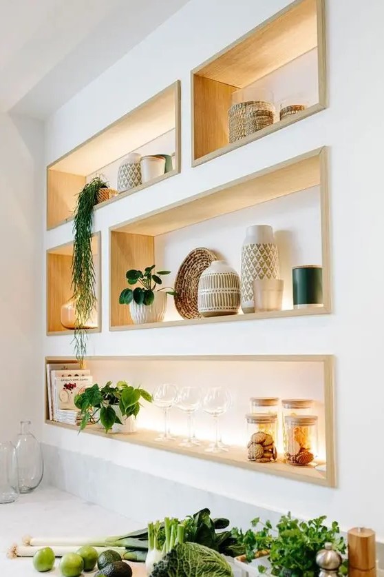 cool niche shelves with stained wooden framing and lights will display your stuff at their best