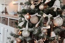 copper and silver Christmas ornaments with some rustic touches compose beautiful and cozy rustic Christmas decor