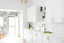 11 a mid-century modern kitchen done in white, with brass handles and faucets looks extremely elegant and chic