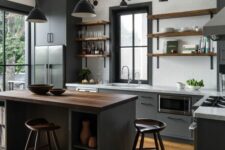 19 a chic kitchen with grey cabinets, open shelves, white countertops, a black kitchen island with a butcherblock countertop