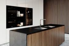 26 a jaw-dropping ultra-minimalist kitchen with sleek white cabinets and built-in appliances, a black kitchen island with timber doors