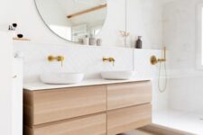 a lovely bathroom with a floating vanity