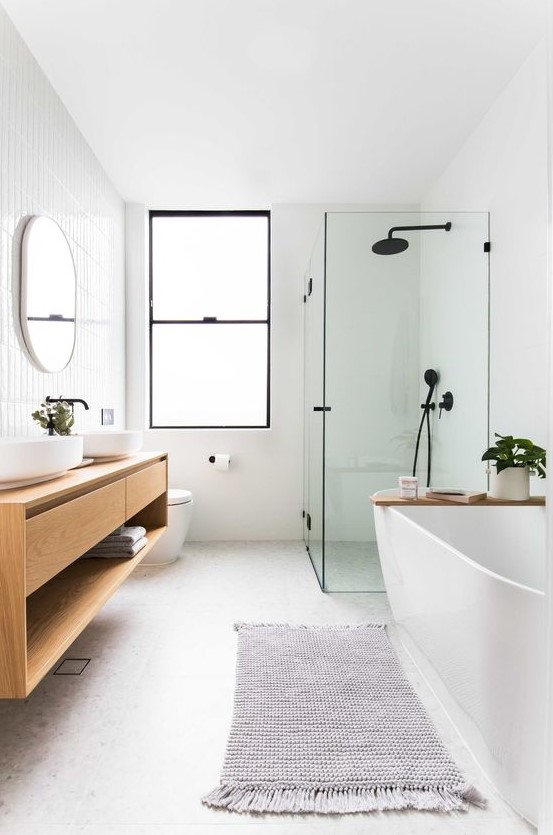 a lovely bathroom with skinny tiles