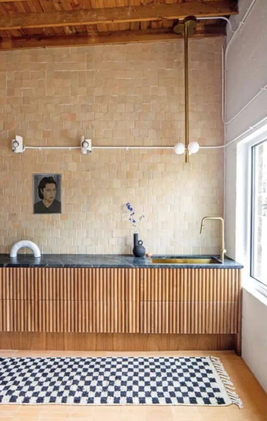 a lovely kitchen with Zellige tile wall