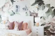 09 a dreamy bedroom with a pastel floral mural, white furniture, an artwork, white lamps and pastel bedding
