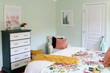 a stylish bedroom with b&w dresser