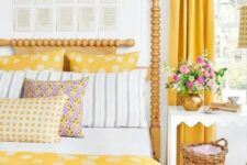 40 bold yellow curtains, polka dot pillows and a matching bedspread for a springy bedroom