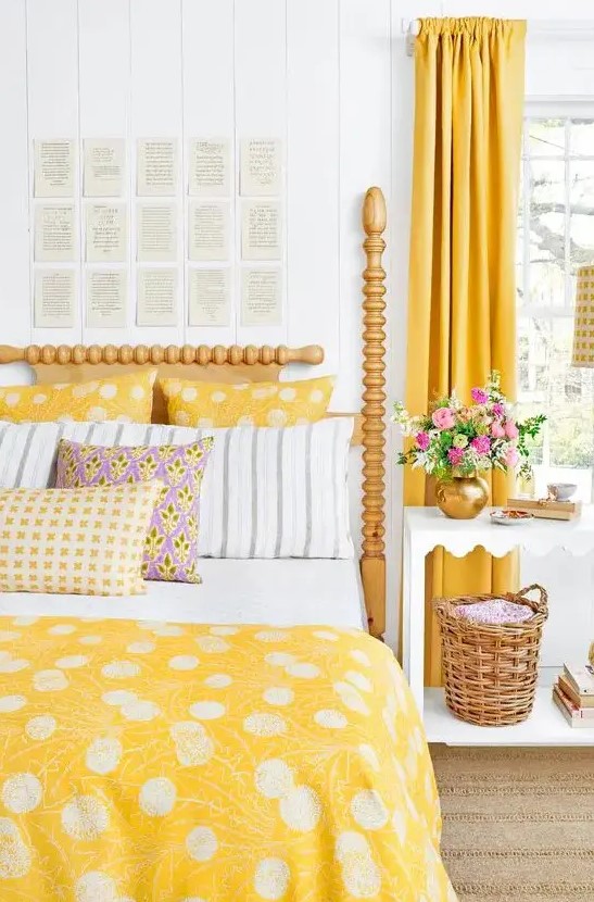 bold yellow curtains, polka dot pillows and a matching bedspread for a springy bedroom