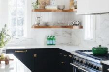 a black U-shaped kitchen with a white quartz backsplash and countertops, stained corner shelves and greenery