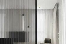 a fluted glass space divider is a beautiful idea for a refined space, it brings ultimate elegance and separates the spaces