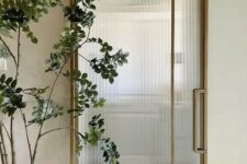 a stylish barn door with a glass insert