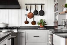 a lovely kitchen with black granite countertops