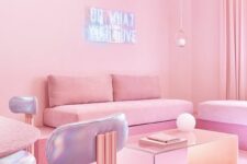 a minimalist pink living room with pink sofas and a coffee table, a pink table and holographic chairs, neon lights is a very eye-catchy space