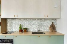 a pastel two-tone kitchen design