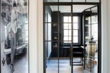 beautiful black French metal frame doors perfectly match the style and add chic and a refined touch to the space