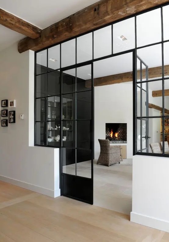 black framed French doors for connecting the interiors with each other will match many interiors