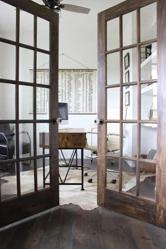 dark-stained French doors can work in a farmhouse interior and look absolutely cohesive thanks to the staining