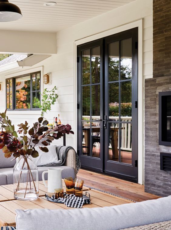 exterior black French doors are a lovely addition to many spaces, and they will contrast your neutral outdoor space