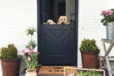 keep your pets at home while having breezes and fresh air inside with a comfy Dutch door, like here, a black Dutch door