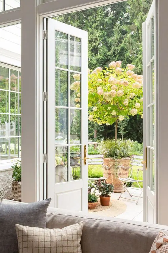 neutral French doors with gold handles are amazing to finish off a refined neutral space and make it more welcoming