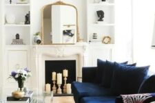 a lovely living room with a candle fireplace