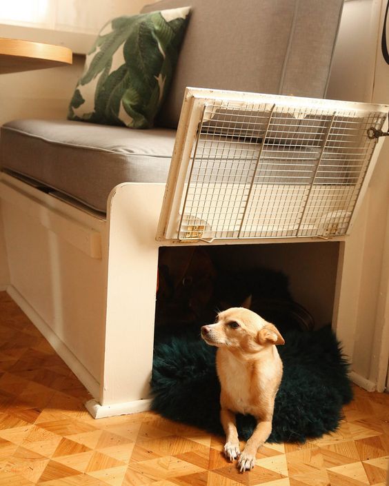 a bench for a dining room with a built in dog crate is a stylish and cool idea for a modern space, and your pet is next to you