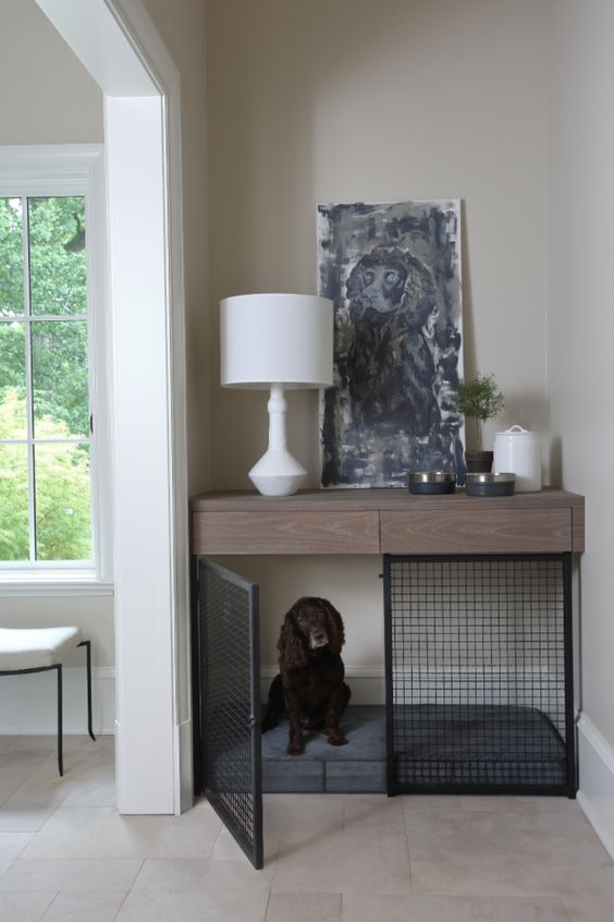 a built-in dog crate that doubles as a console table in the entryway is a stylish and smart idea to rock