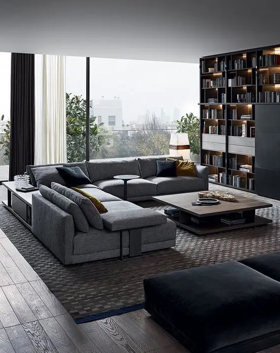 a dove grey L shaped sofa matches the contemporary and edgy room style and makes it look bold