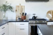 a modern farmhouse b&w kitchen design