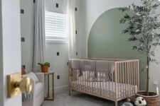 a cute nursery design in pastel green