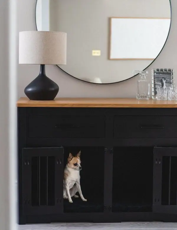 a stylish black console table with built in dog crates is a lovely idea for a modern high end interior